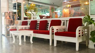 a group of chairs and tables in a store at Lime Hotel in Patong Beach