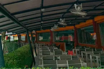 an empty theater with chairs and lights on the ceiling at MaiKhao Sunrise Sight Space in Ban Mai Salae