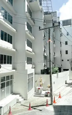 a white building with orange cones in front of it at BAOBAB in Patong Beach